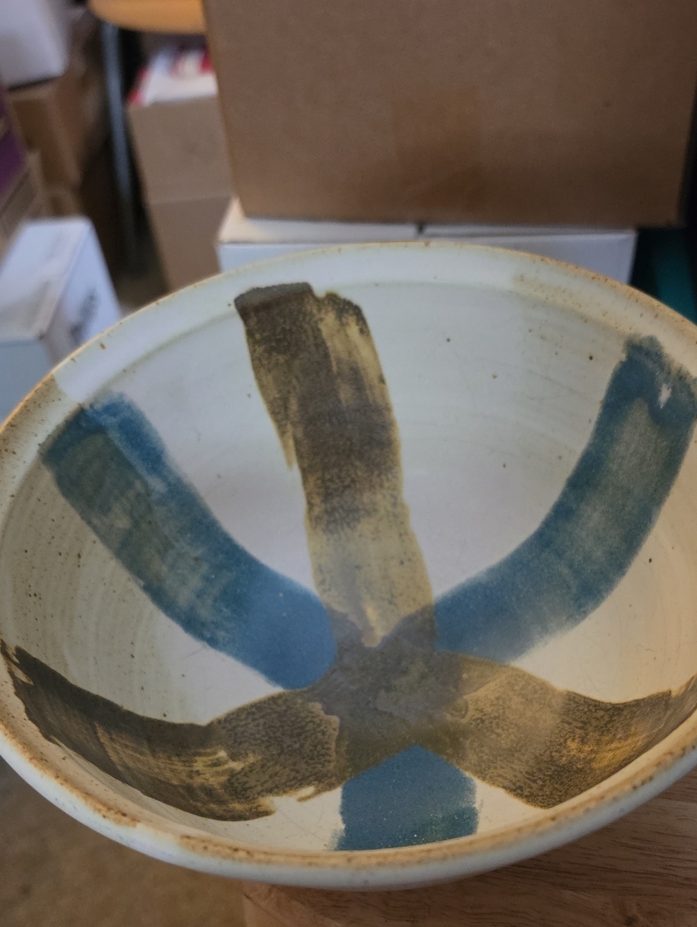 Hand-Painted pottery bowl in blue and brown